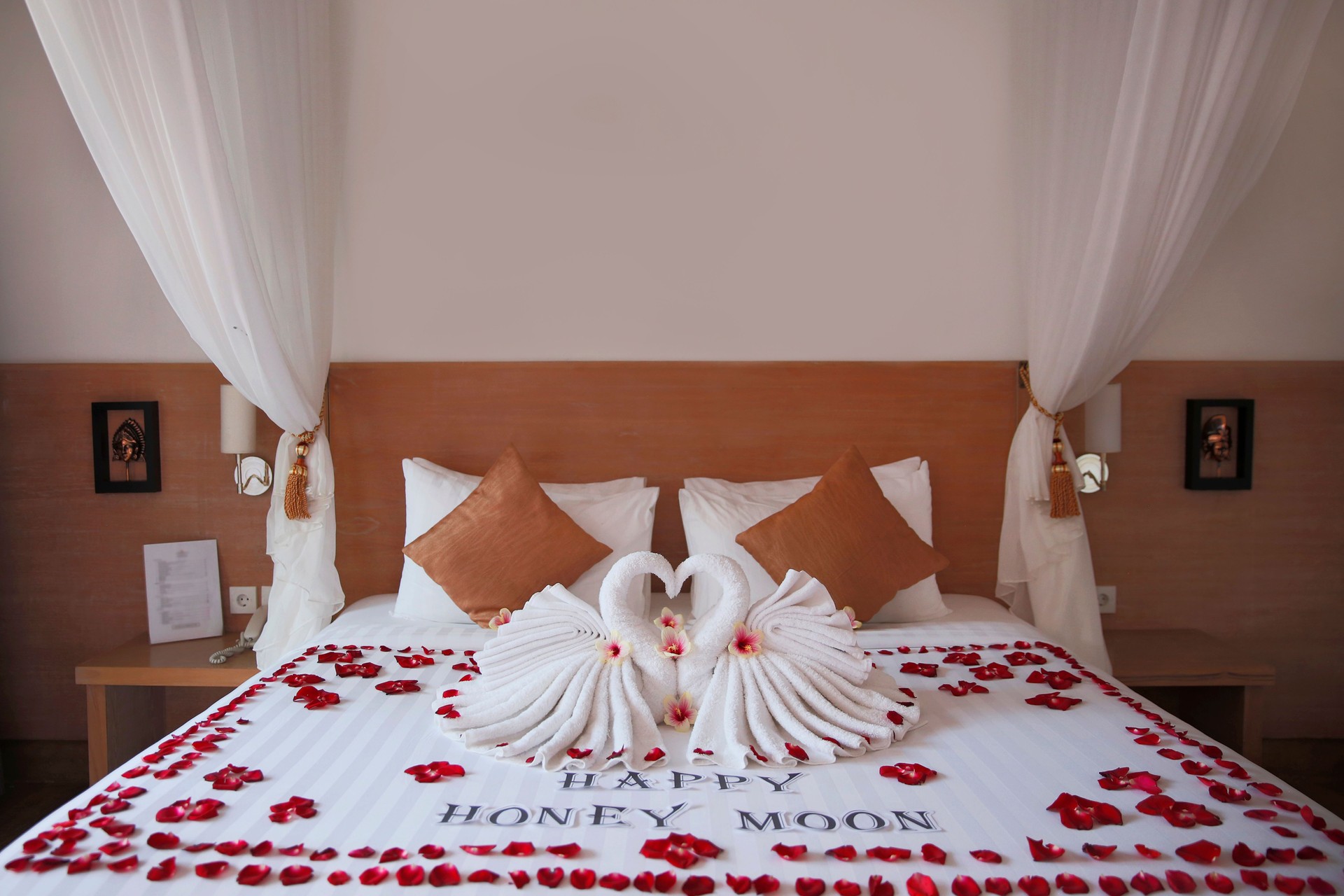 Two folded swan towel decoration in honeymoon room